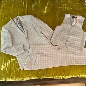 COPY - Mens 3 piece suit. Coat size 38. Pants size 30x32. Euro slim fit